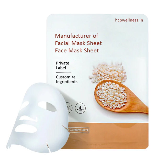 Woman applying a facial sheet mask